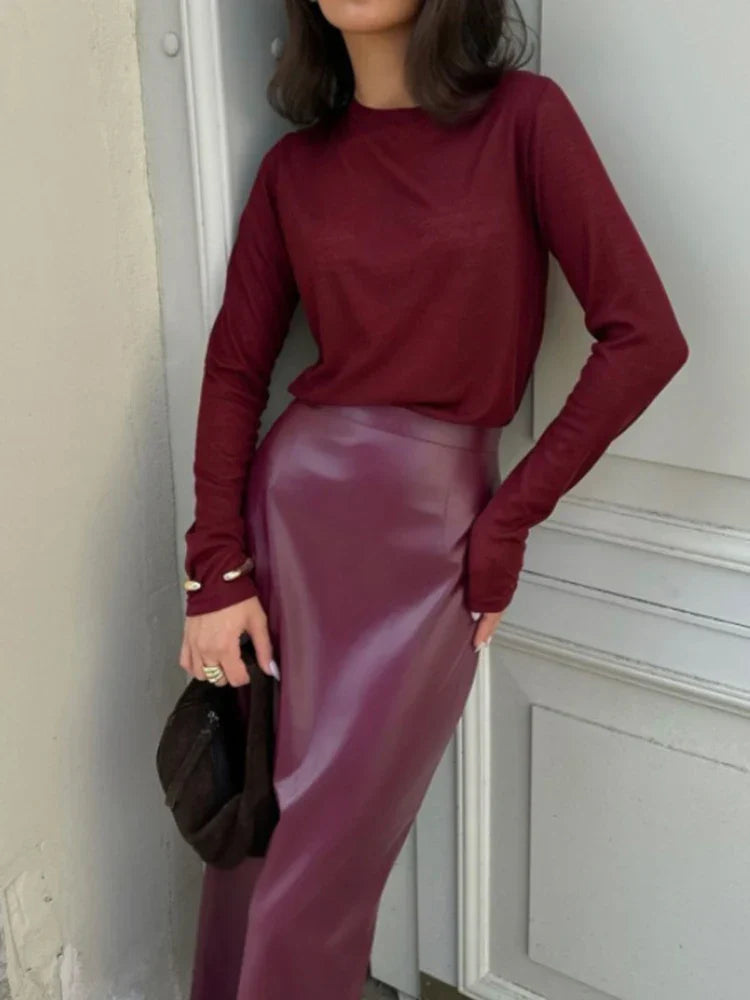 Janine | La Jupe Midi en Vinyle Luxe
